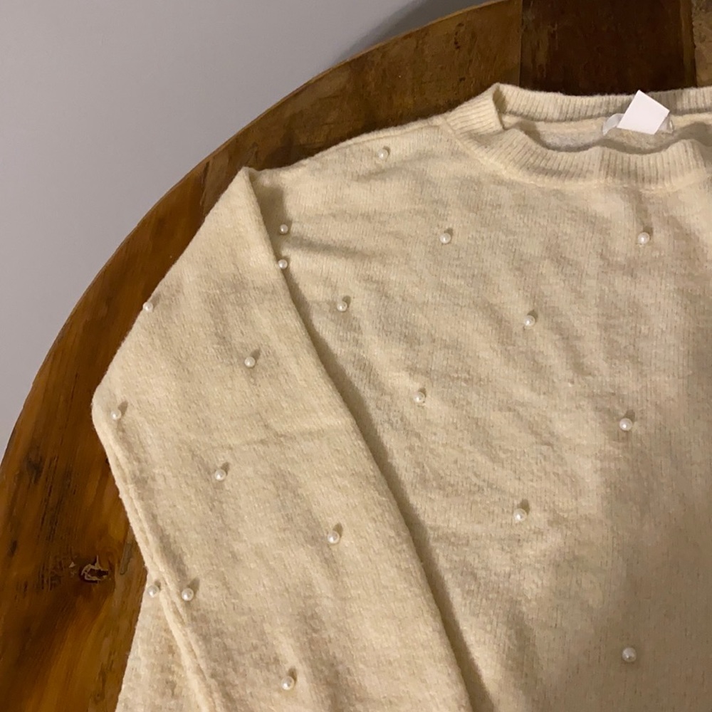 Cream sweater with pearls on front and sleeves
